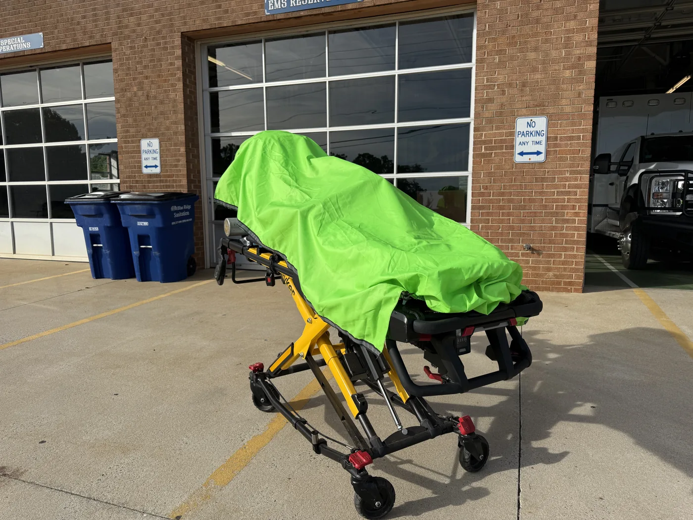 Covered stretcher inside ambulance